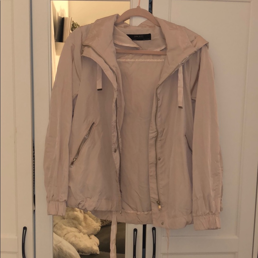 Dusty rose colored windbreaker